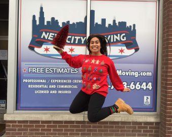 new city moving employee jumping in the air