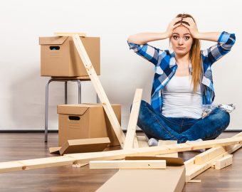 stressed customer trying to put furniture together