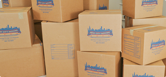 a pile of new city movers cardboard boxes