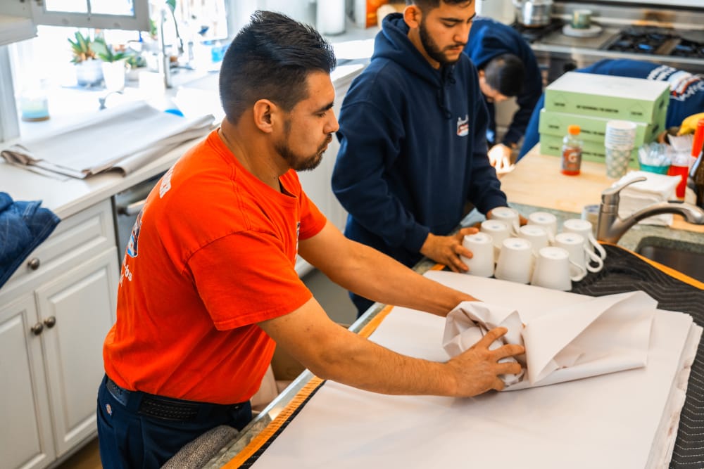 Properly packing glasses for moving.