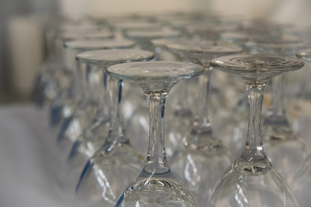 Wine glasses being readied for packing.