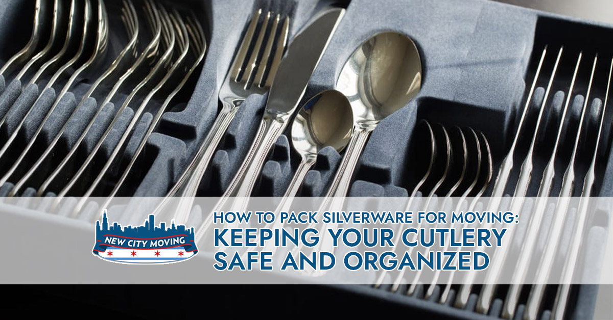 Packing silverware for moving.